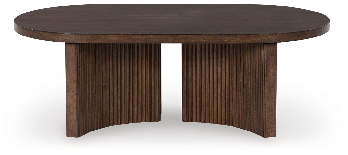Korestone - Oval Cocktail Table - Dark Brown